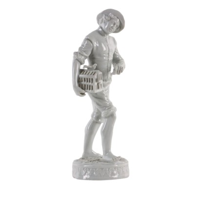 Young Man with Cage Porcel Figurine