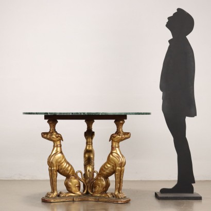 Table ronde avec sculptures de lévriers