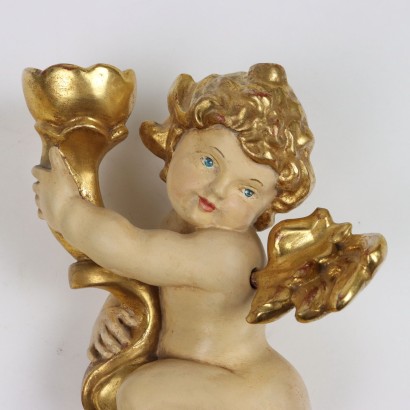 Coppia di Putti in Legno Intagliato