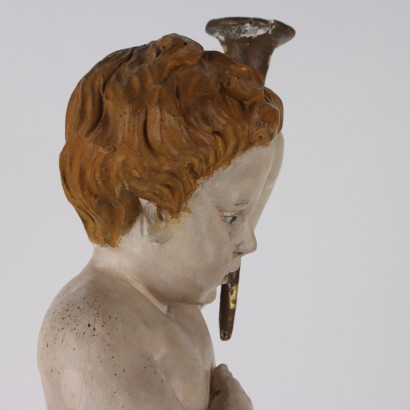 Putto Holding the Torch