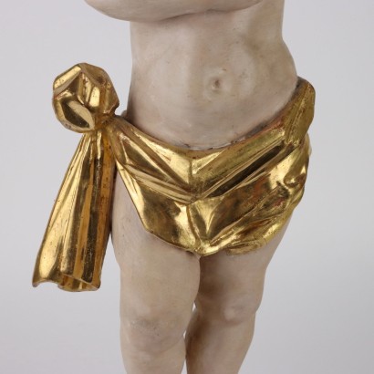 Putto tenant le flambeau