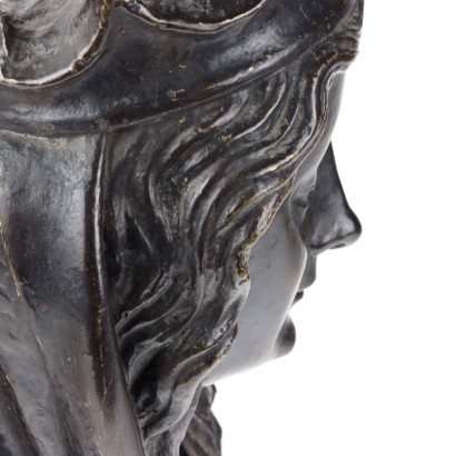 Female Face in Bronze