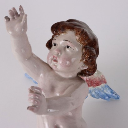 Putto en majolique